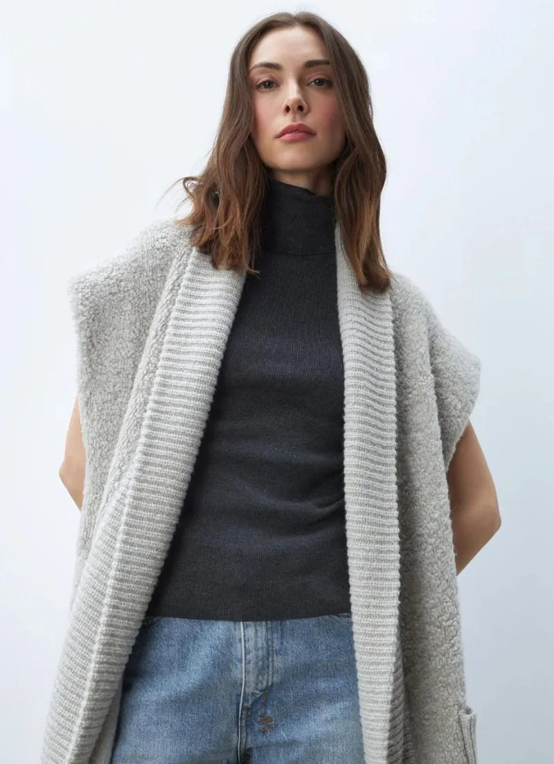 Emilia Knit can be rewritten as Knitwear by Emilia