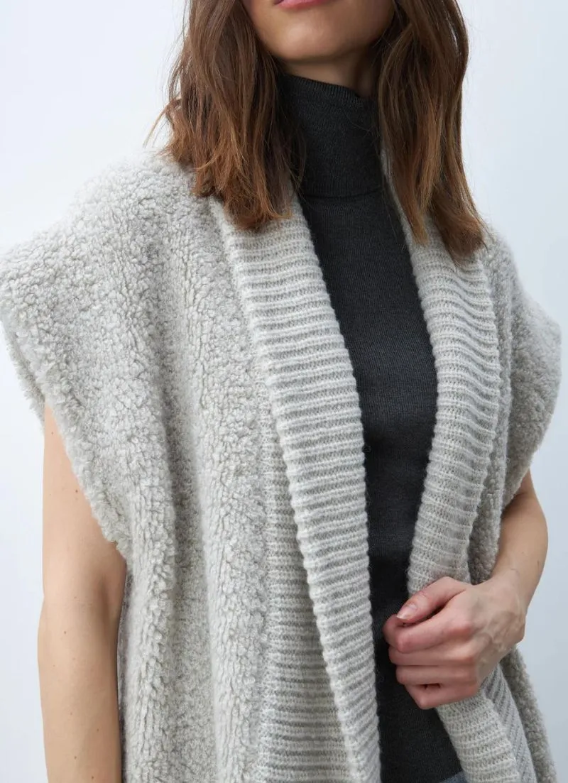 Emilia Knit can be rewritten as Knitwear by Emilia