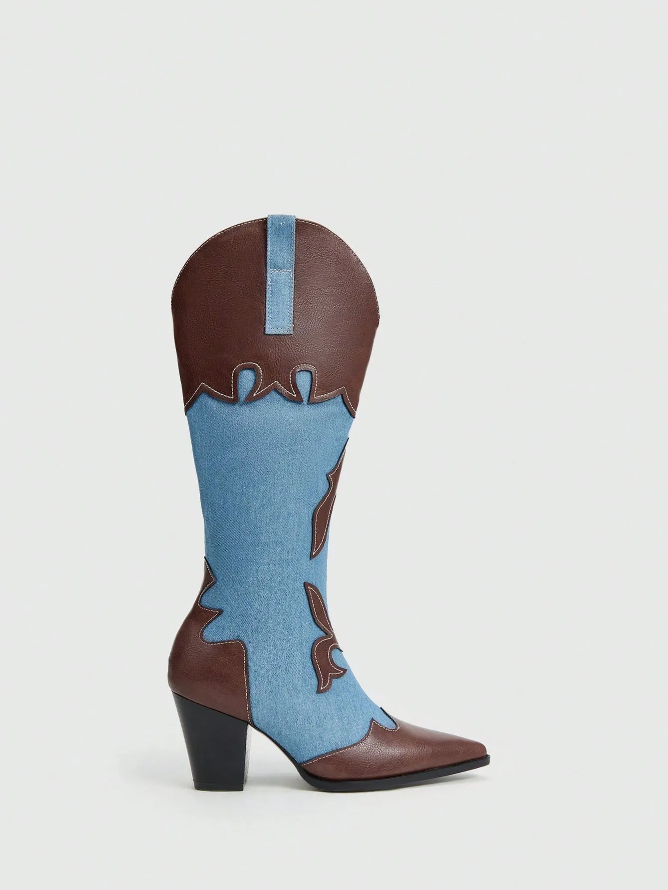 Fashionable and comfortable women's western boots with contrasting colors, pointed toe, and block heel