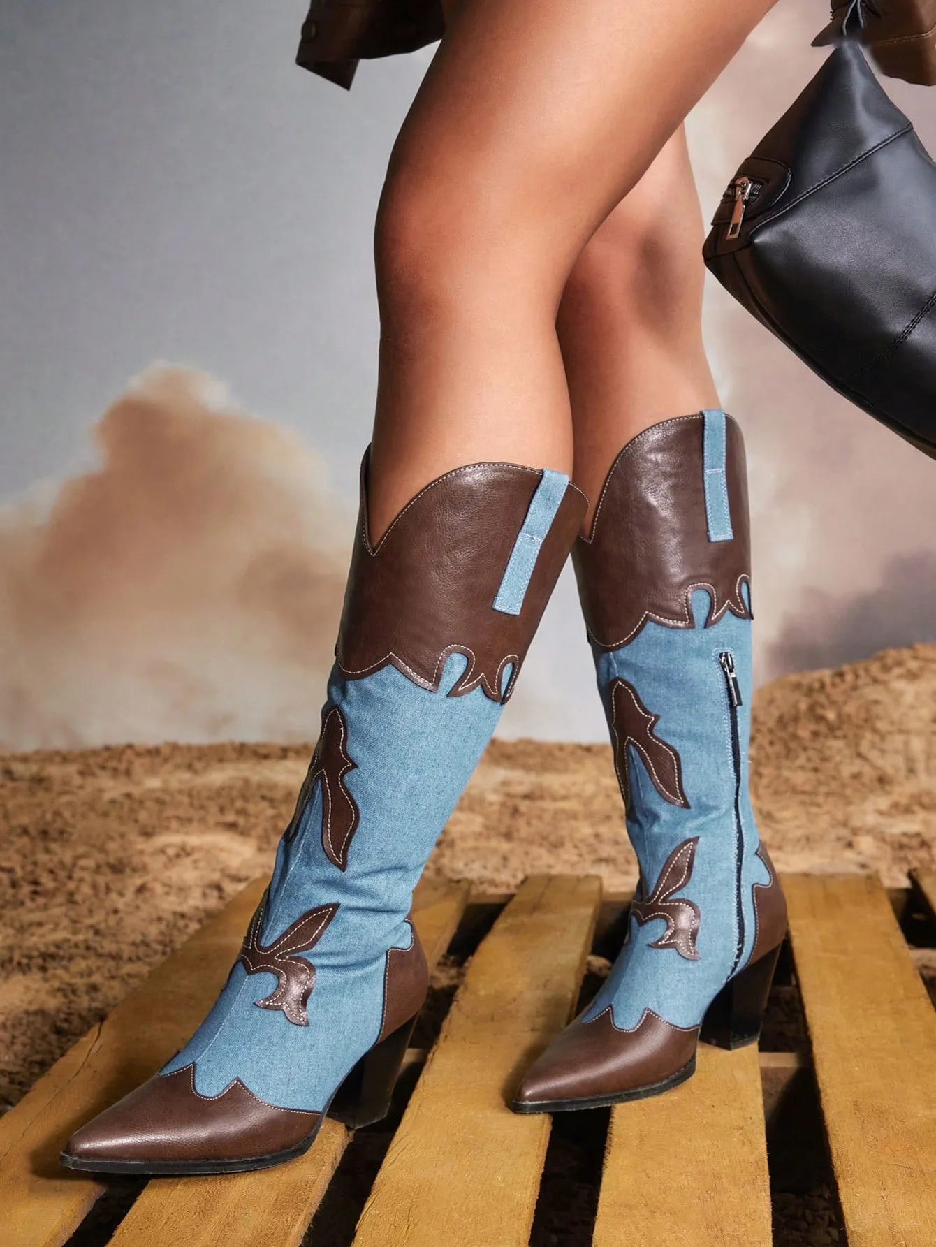 Fashionable and comfortable women's western boots with contrasting colors, pointed toe, and block heel