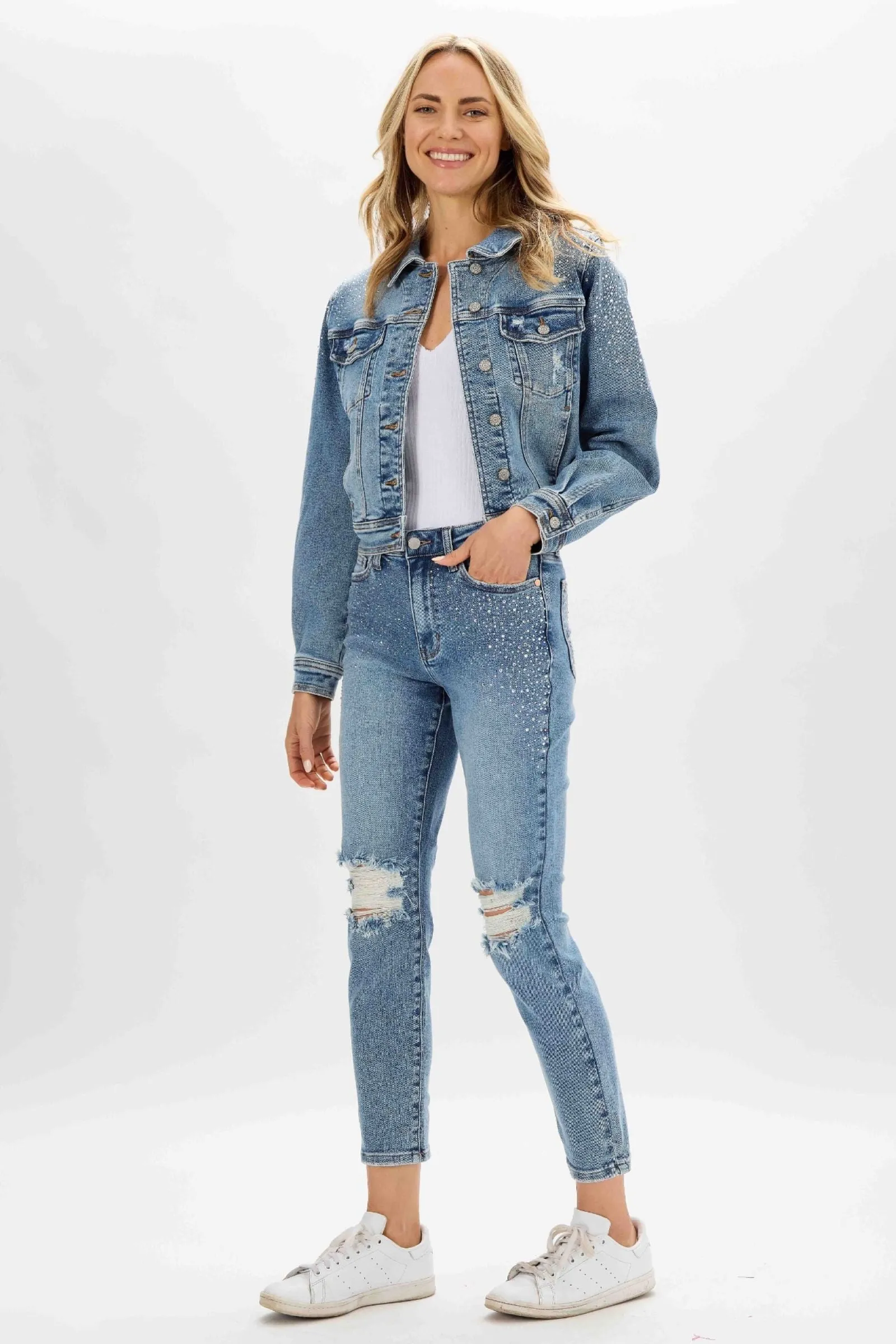 Judy Blue high waist slim fit jeans with rhinestone embellishments and distressed details.