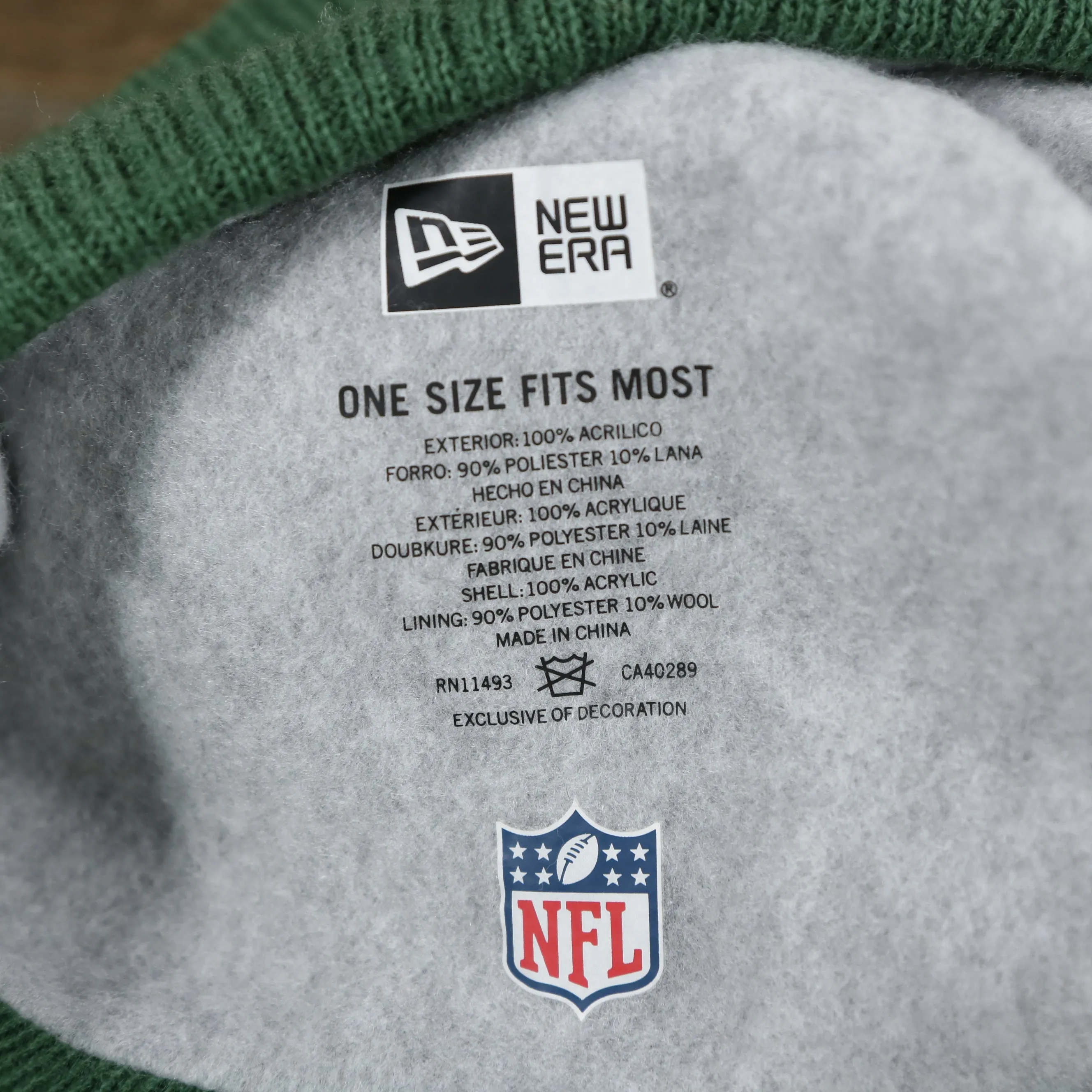 New York Jets Pom Pom Winter Beanie - Green and Gray, On-Field Striped Wordmark.