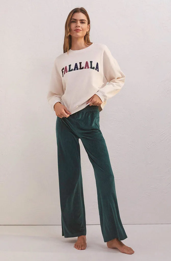 Z Supply Fa La La Sweatshirt is a stylish and festive sweatshirt that is perfect for the holiday season.